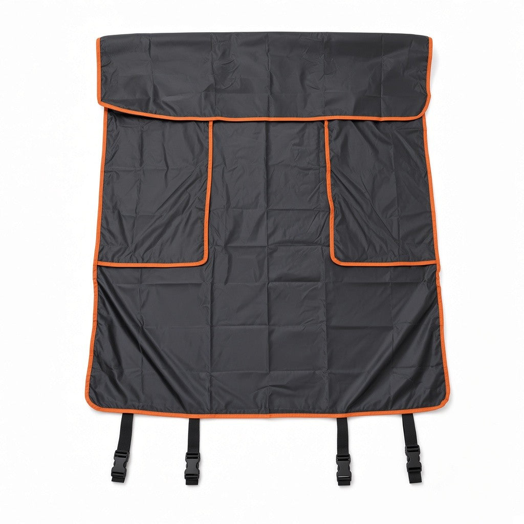 Cargo area pet liner laid flat on a white background with orange piped edges and anchor straps