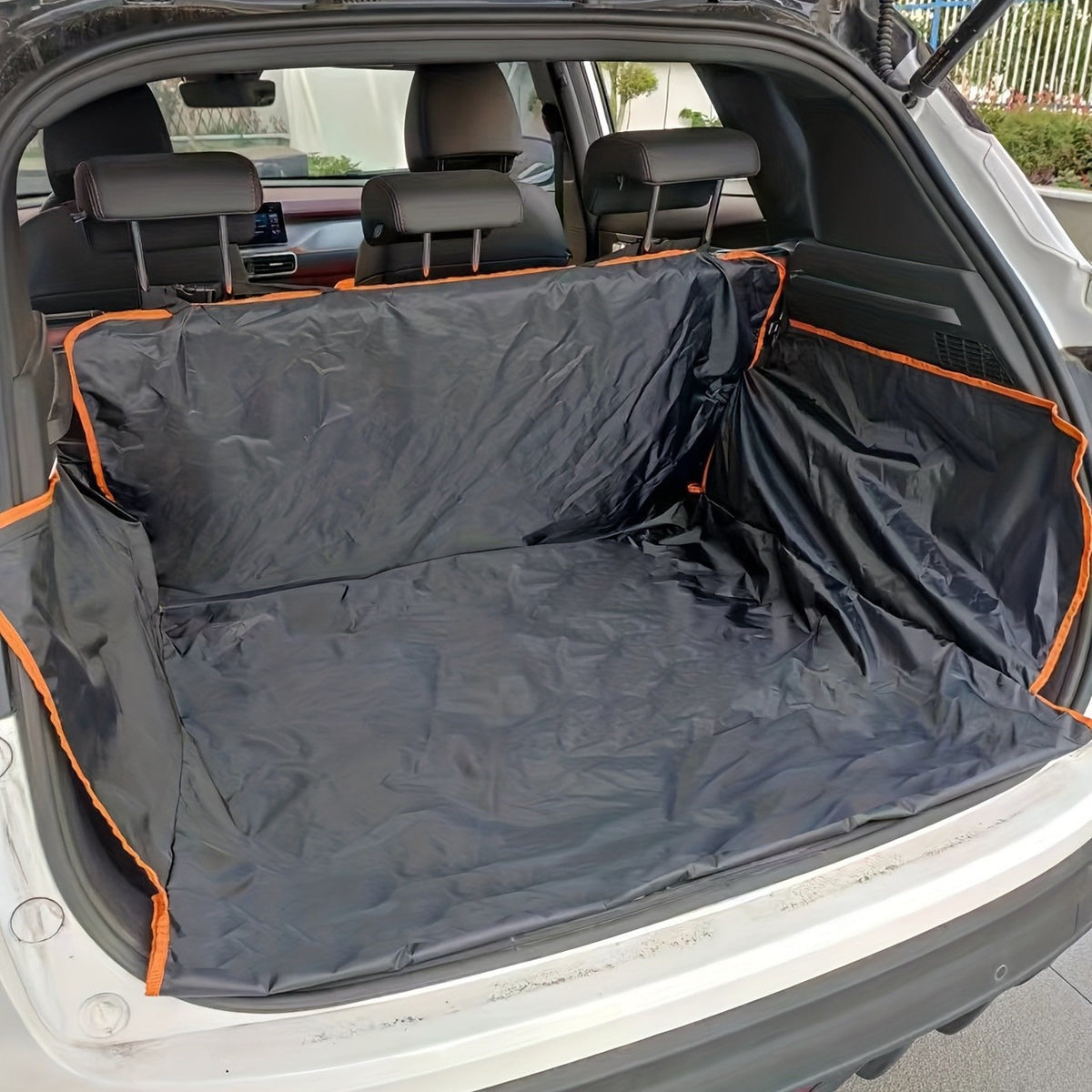 Cargo liner covering the floor and side walls of an SUV cargo area