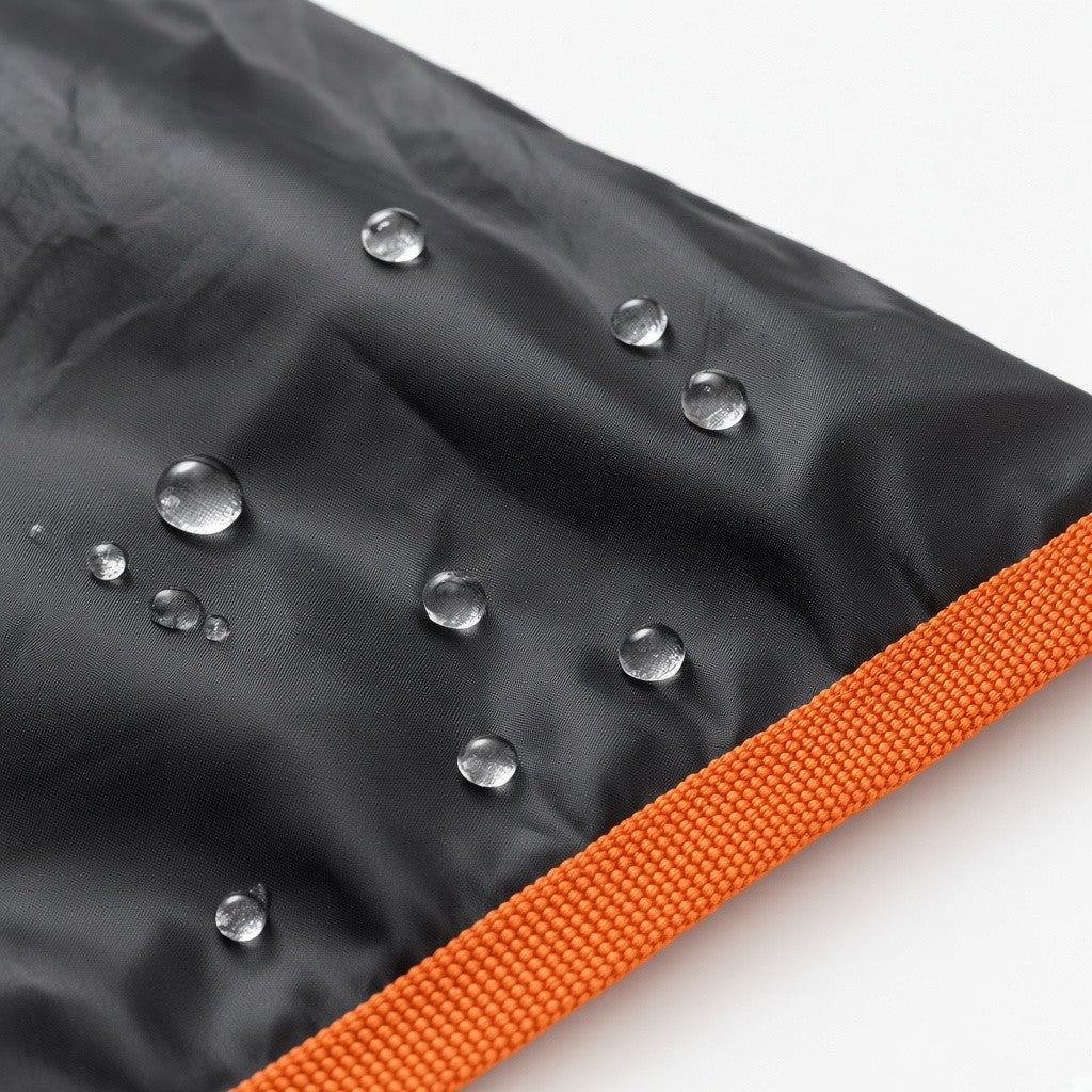 Water beading on the cargo liner fabric beside the orange piping